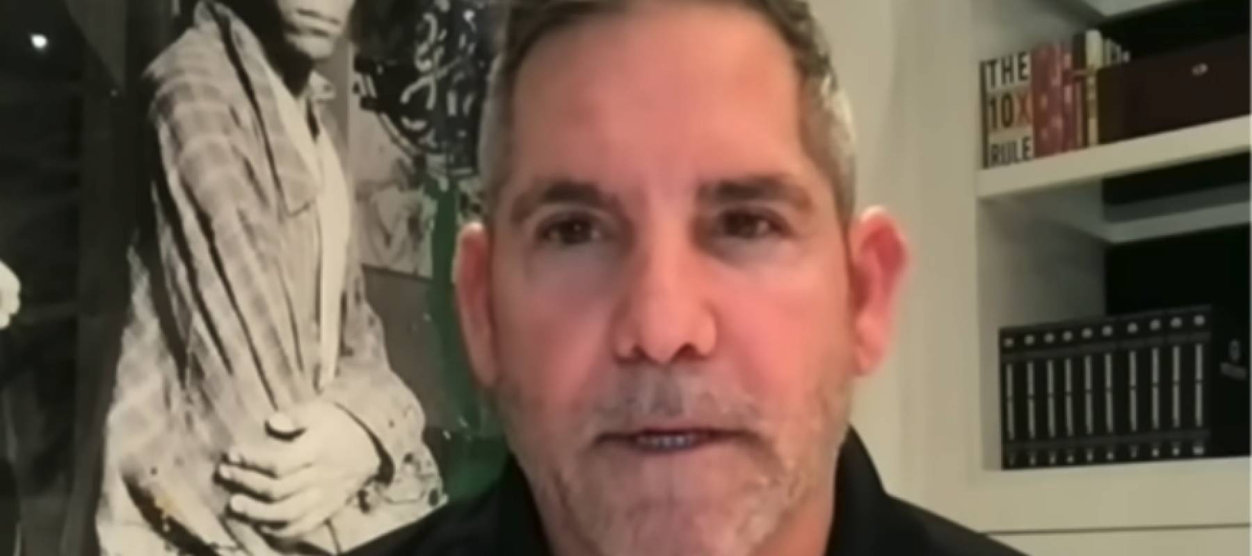 Grant Cardone in his home office, speaking directly to the camera.