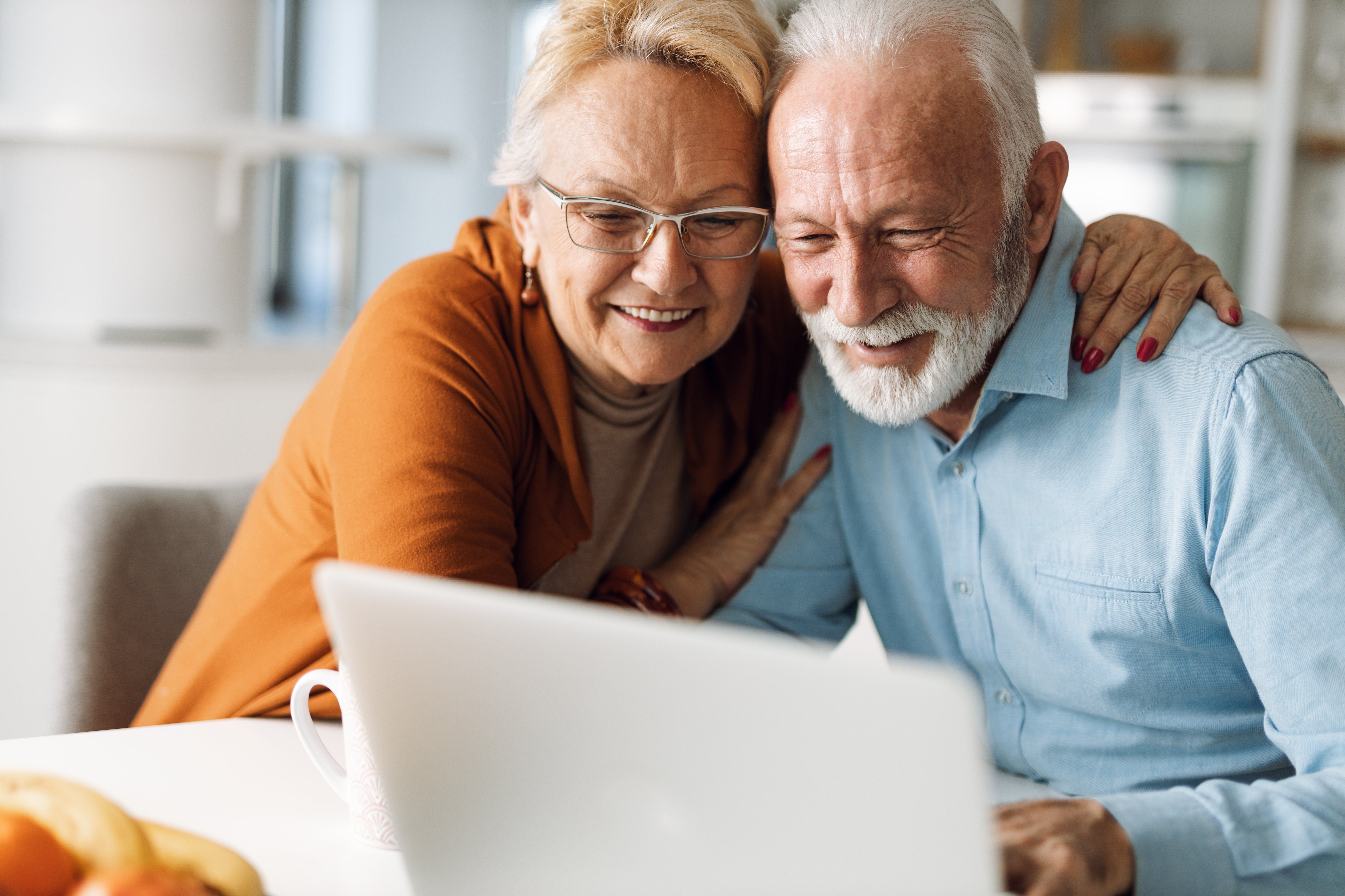 Retired couple reviewing retirement plan